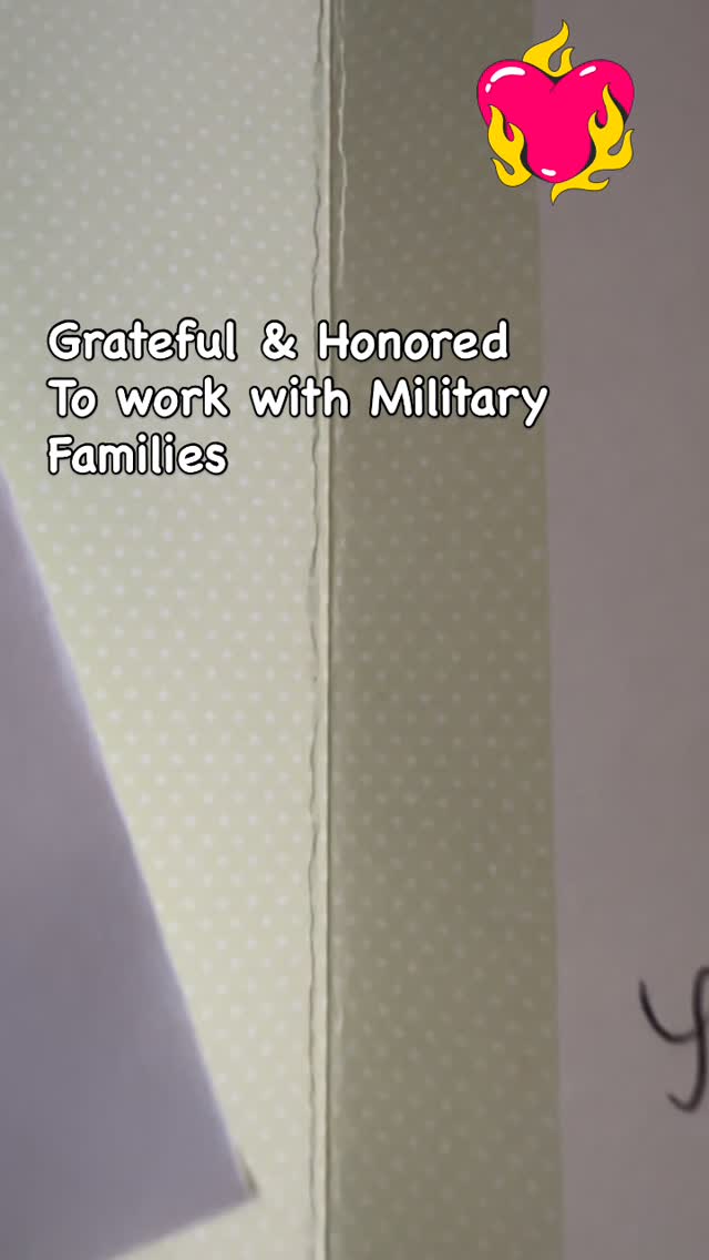 Yvonne Russell presenting an American flag gift to a military client family